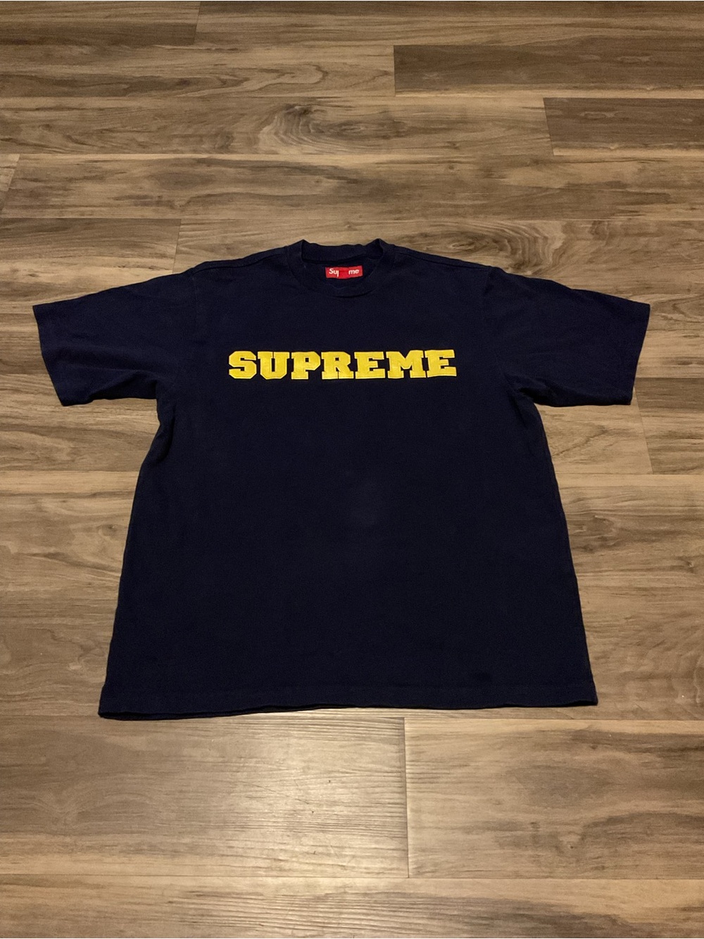 Supreme Navy Short Sleeve Tee with Yellow Chest Logo
